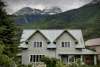 Stunning house picture across from airport on awesome cloudy day