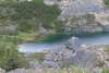 Beautiful emerald lake from glacier melting ice within mountains