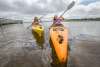 Two girls kayaking on Shell Lake