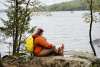 a hiker at Gifford Pinchot State Park enjoying the view of the lake