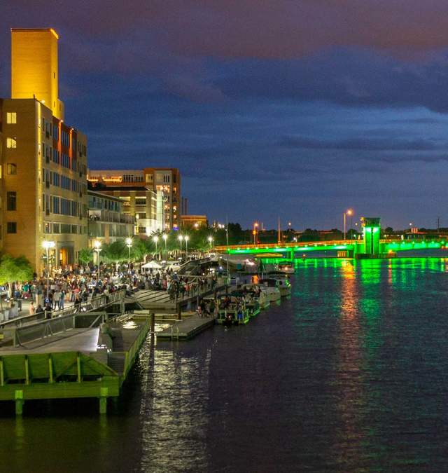View from the water overlooking downtown and bridges in Green Bay
