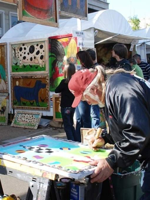 Man Painting at Three Rivers Art Festival in Louisiana North Shore