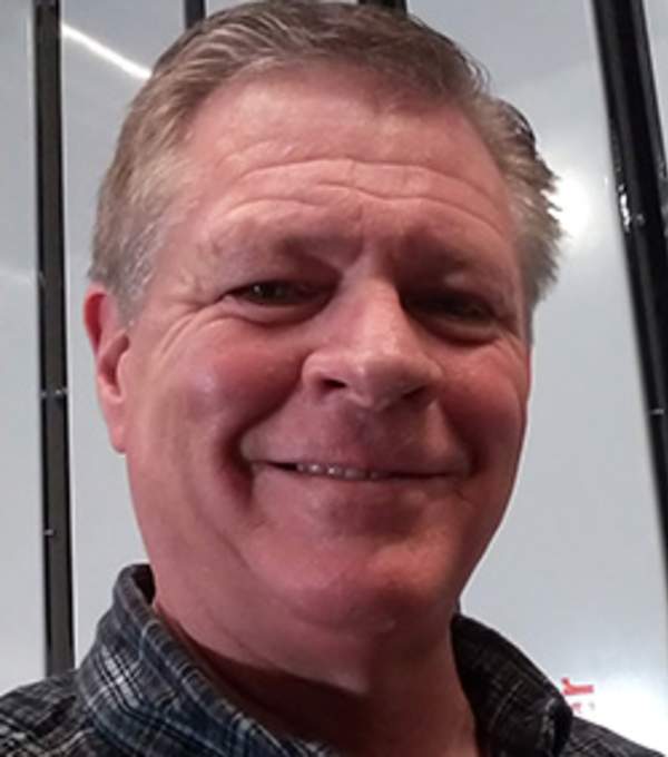 a headshot photo of Board Member, Bruce Sauer