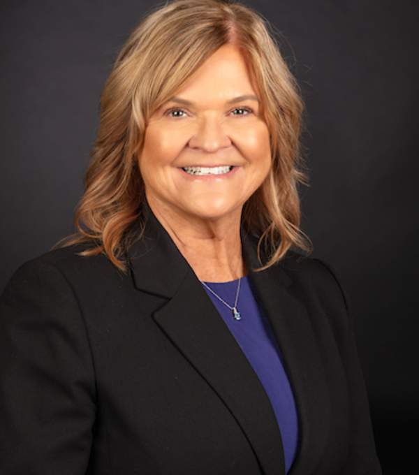 a headshot photo of Board Member, Deborah Pummel