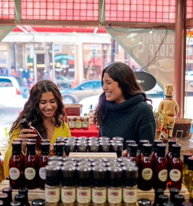 Two people shopping at Galena Canning Co.