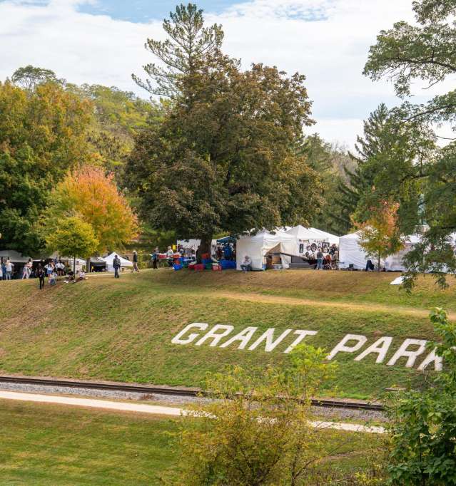 Crowd of visitors and tents at the annual Country Fair event in Galena.