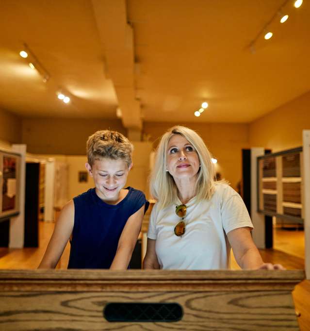 Family exploring museum