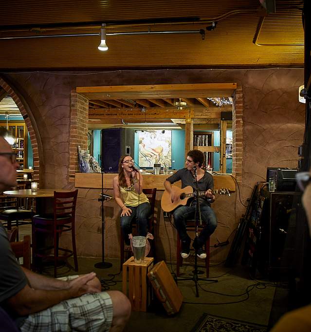 Couple performing live music in bar