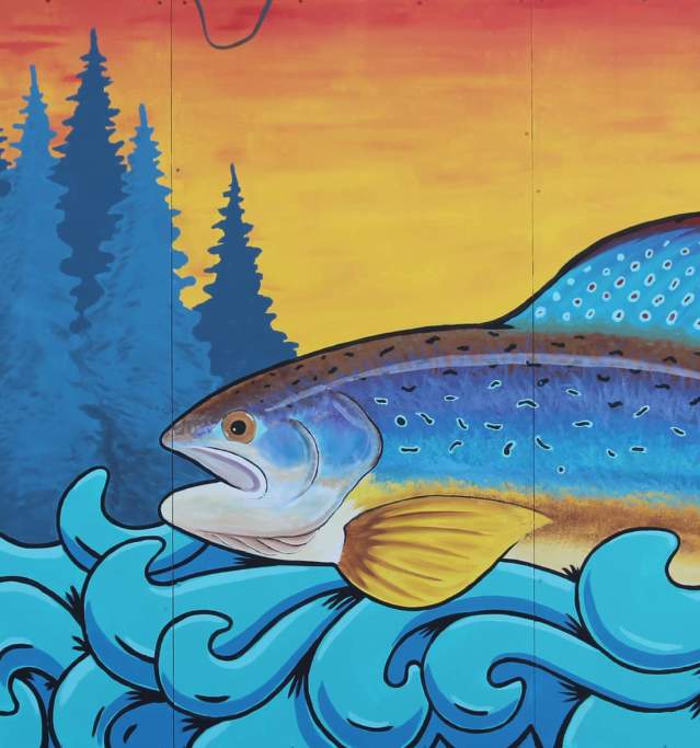 Picture of a trout painted on building at Fish Hatchery