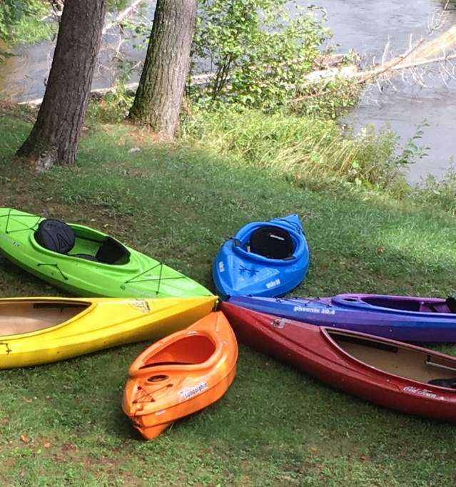 Kayaks in a circle on river