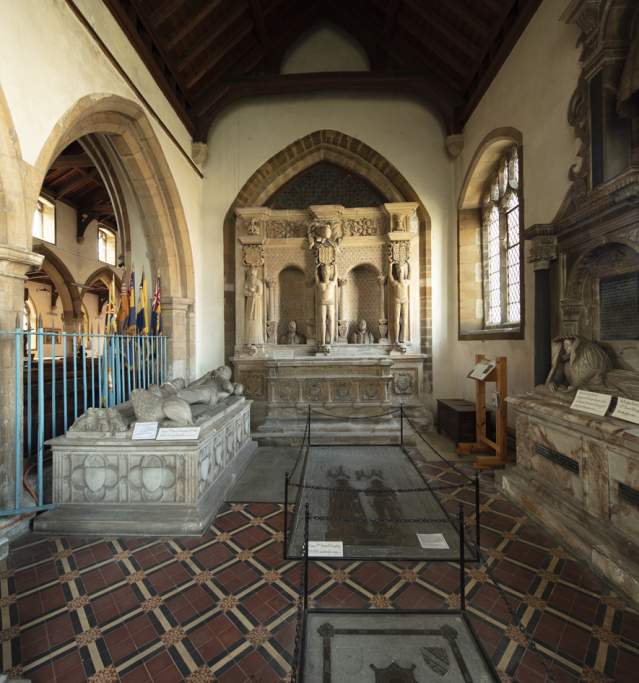 Interior of church with statues and archways