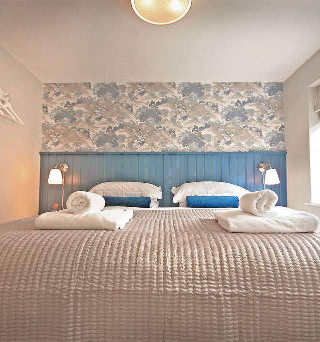 A bed with towels
