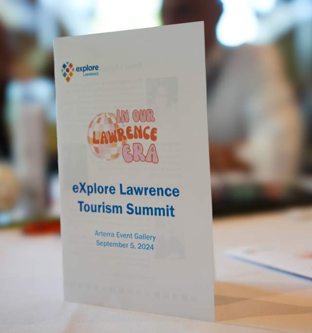 Cover of program on table at event