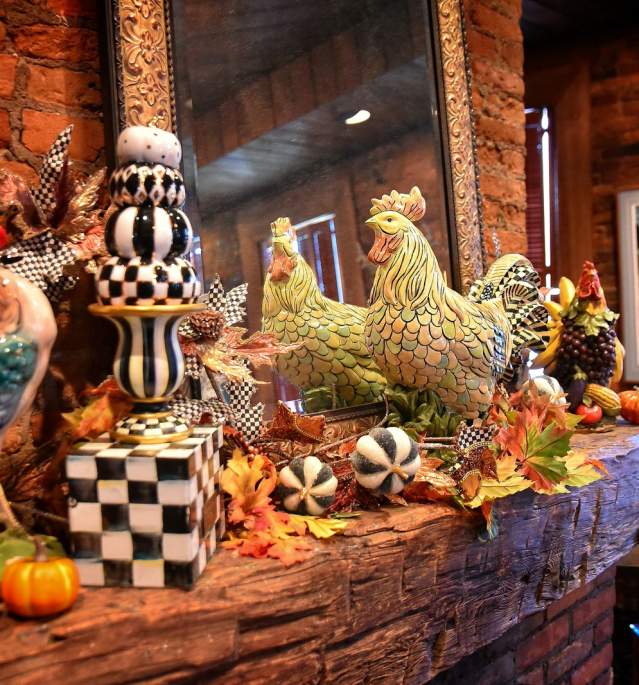 Fireplace mantle with ceramic decorations