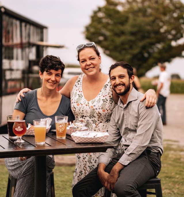 Three People at Brewery