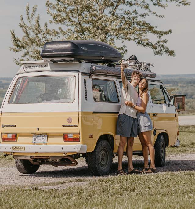 Couple with VW Bus