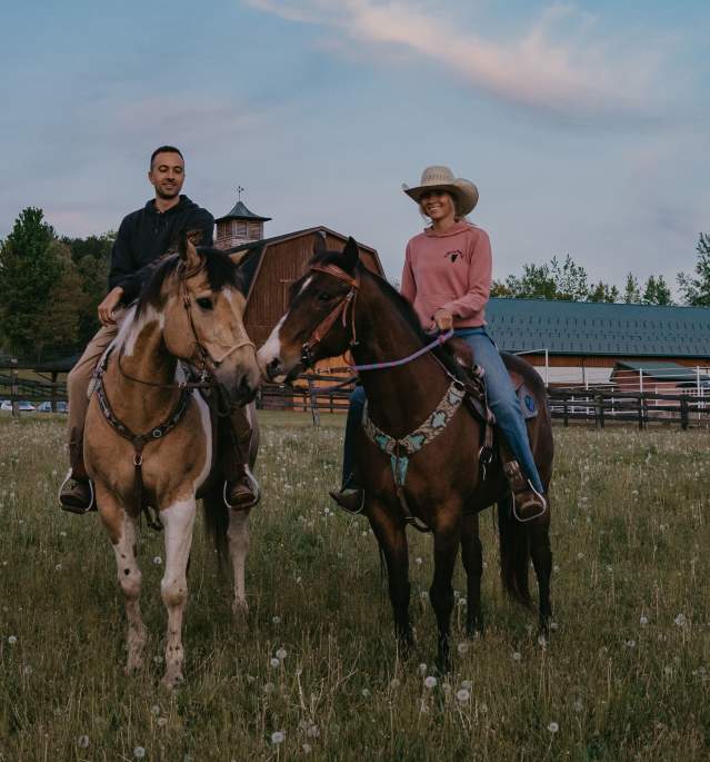 Couple Horseback Riding