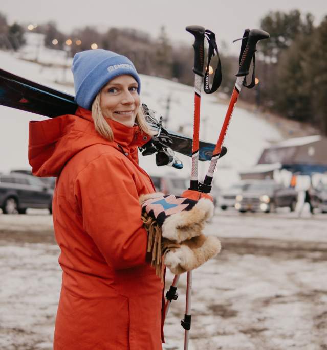 Woman with Ski Equipment