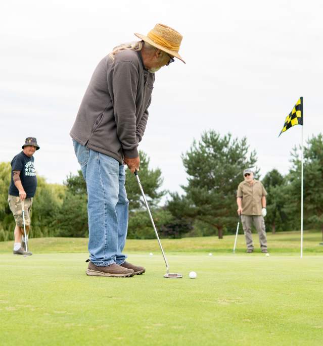 Men Golfing