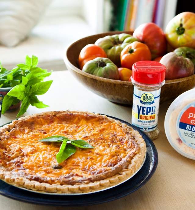 Blue Moon tomato pie with heirloom tomatoes, olives, basil and pimento cheese