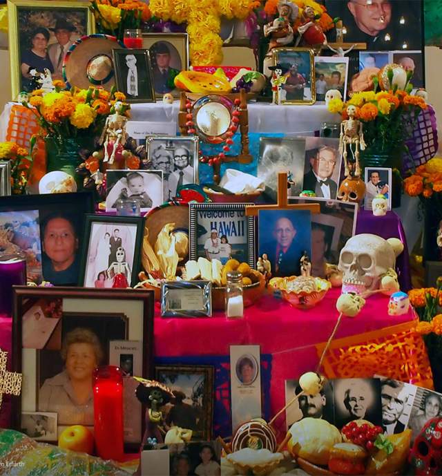 Day of the Dead altar with photos