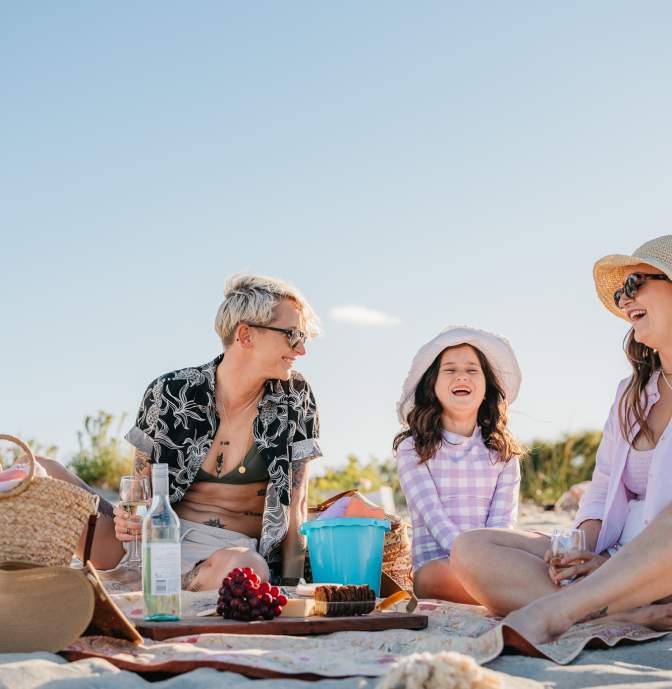LGBT family on beach