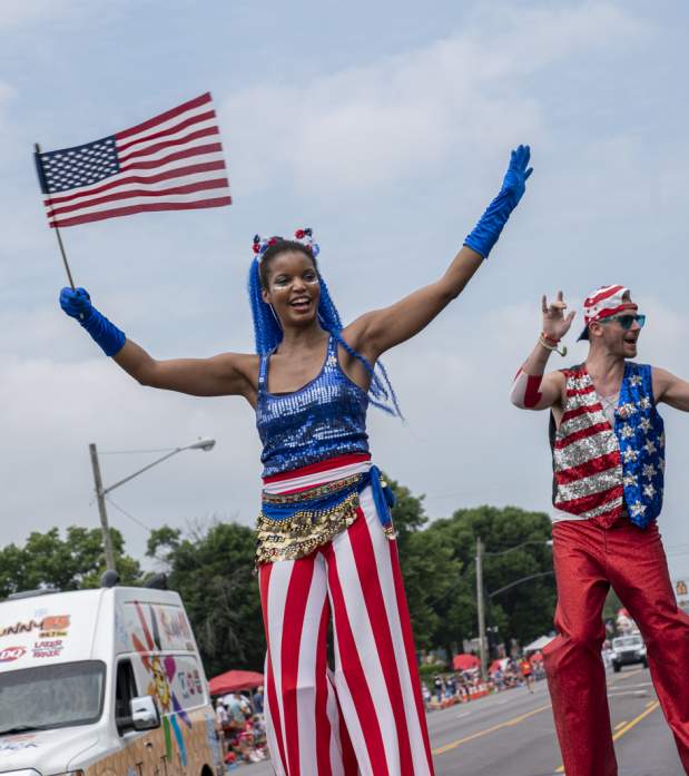 Independence Day stilt walkers in the 4th of July Parade