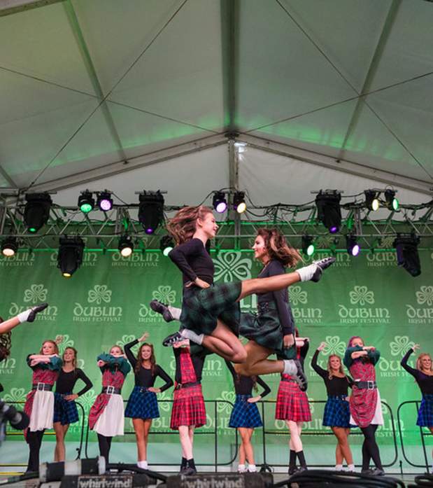 Irish Dancers mid-air performing at the Dublin Irish Festival