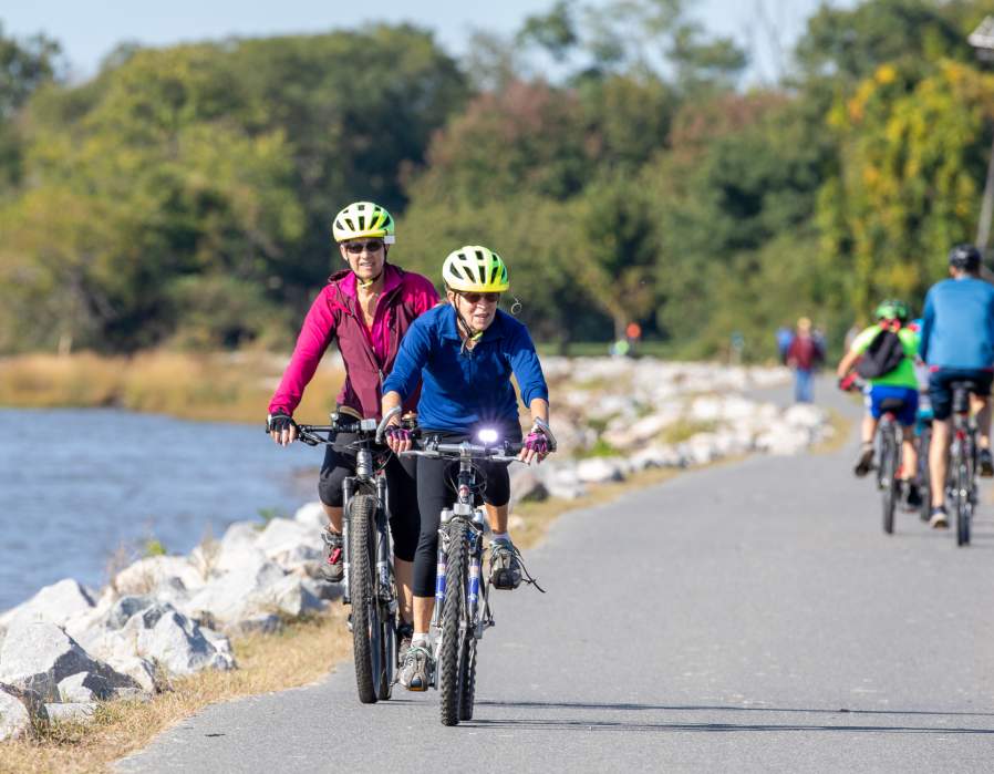 Cyclists on Delaware’s River Towns Ride along scenic Route 9 in Wilmington.