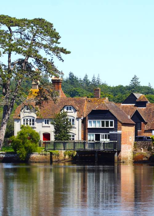 View of houses in Beaulieu over Millpond