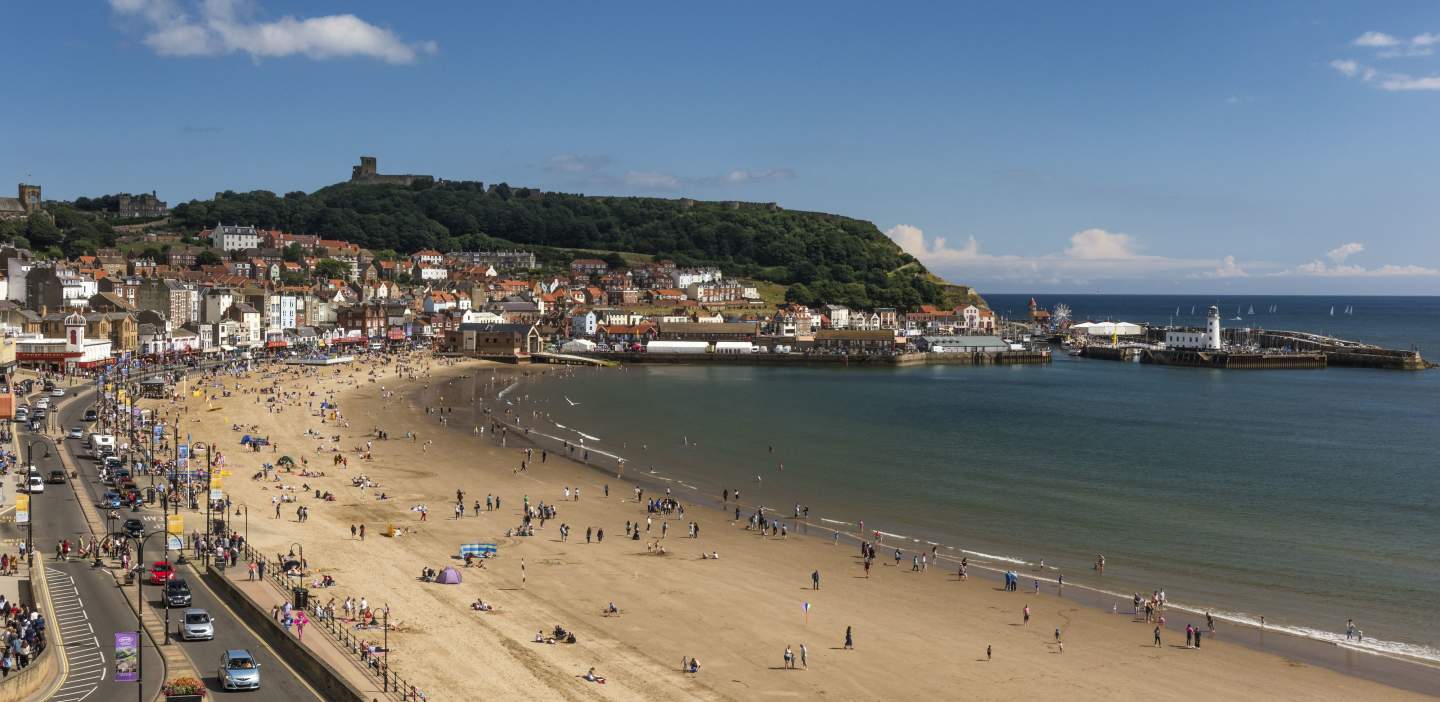 Scarborough South Bay, its beach dotted with people soaking up the rays
