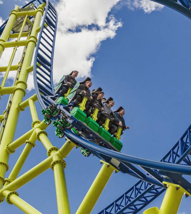 People riding a roller coaster