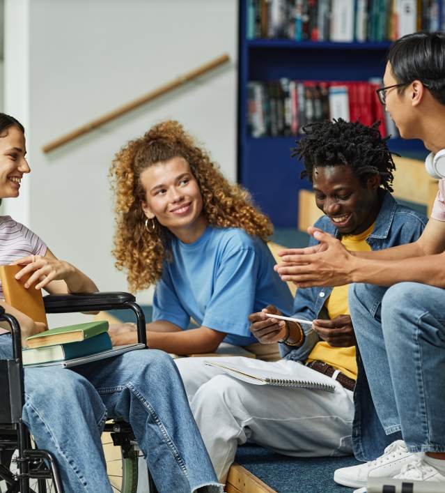 College Students Hanging Out in Library