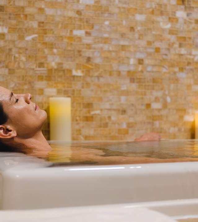 Women in spa bath relaxing