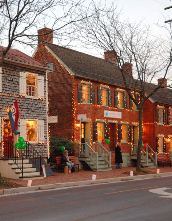 Shops on Shab Row in Frederick decorated in holiday lights
