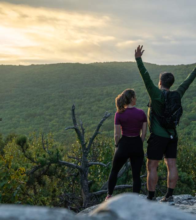 Hikers at the top of White Rocks overlooking the valley.