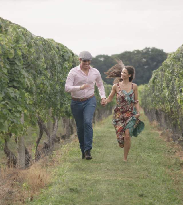 couple running-through-winery