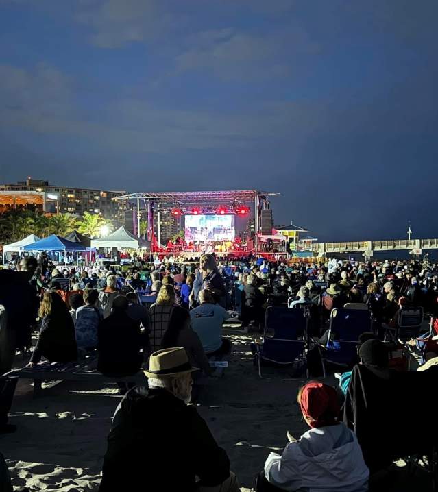 Crowd enjoying the evening beachside Jazz Festival in Pompano Beach