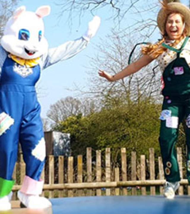 Easter Bunny and Farmer characters on outdoor jumping pillow at Lower Drayton Farm, Staffordshire