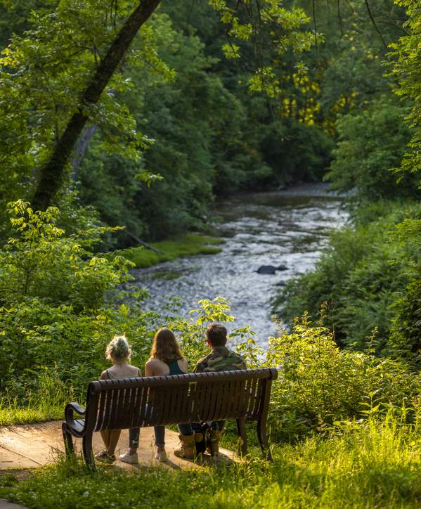 Friends sitting together at Hillsborough Riverwalk