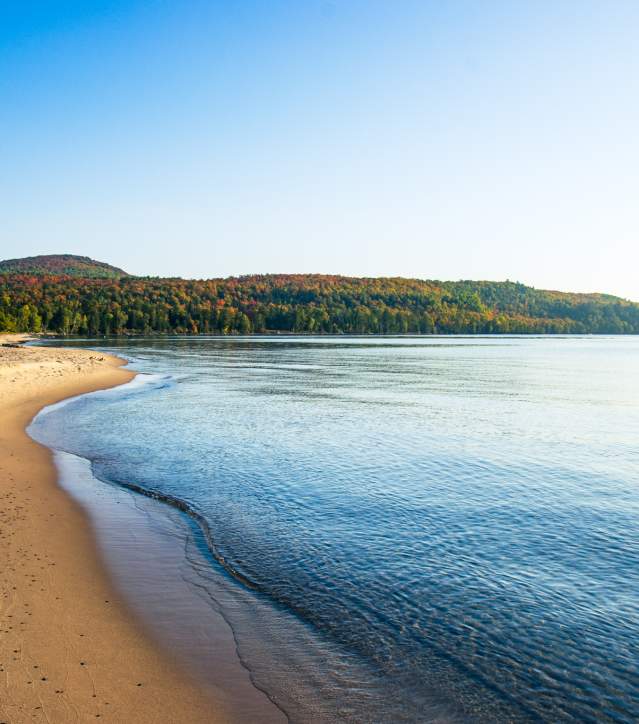 Bete Grise Sandy Beach with mountainous views in background.