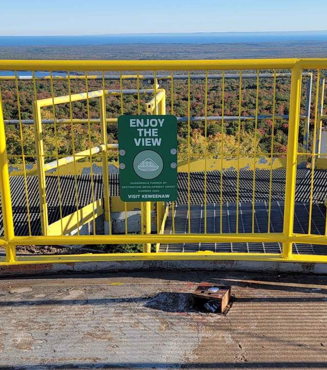 safety railing on the edge of a tall platorm