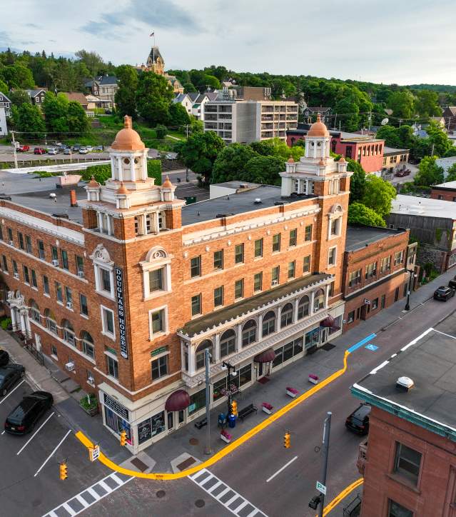 aerial drone shot of the douglass house saloon in a downtown