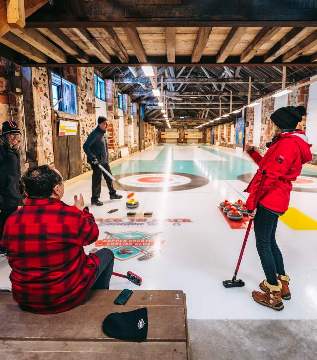 People curling in historic building in Calumet