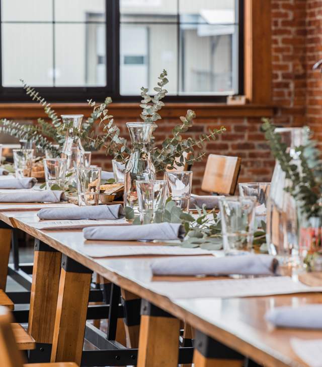 table set with beautiful flowers and wedding placements