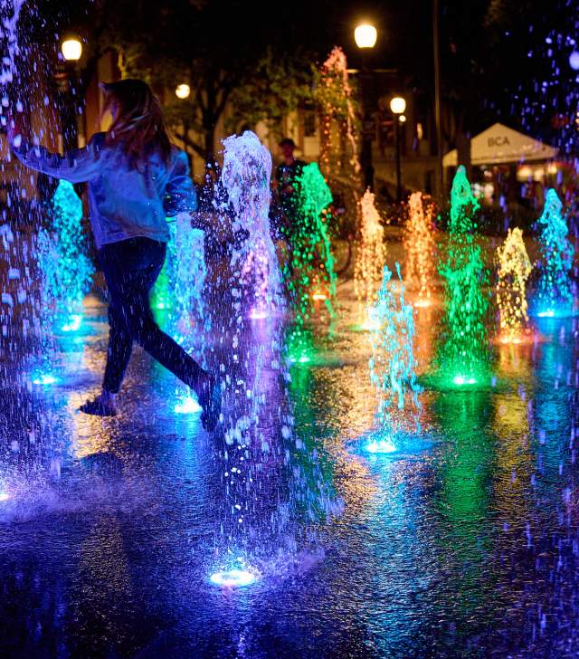 City Hall Park splash fountain at night