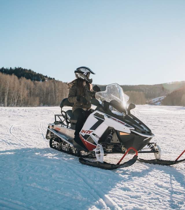 snowmobiling in the winter
