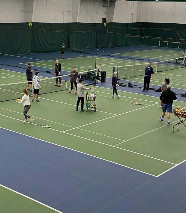 group playing tennis at Green Bay Tennis Center