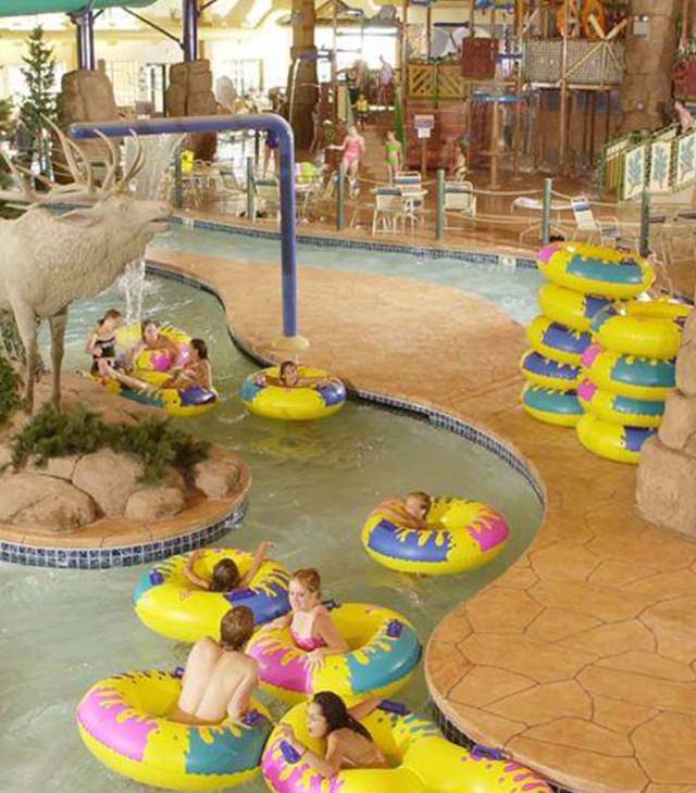 Children riding tubes in the lazy river at Tundra Lodge Resort and Waterpark
