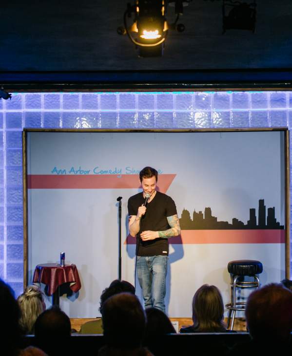 Comedian on stage at Ann Arbor Comedy Showcase